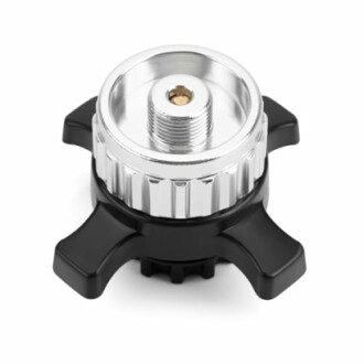 Adaptateur de valve en chrome et noir.