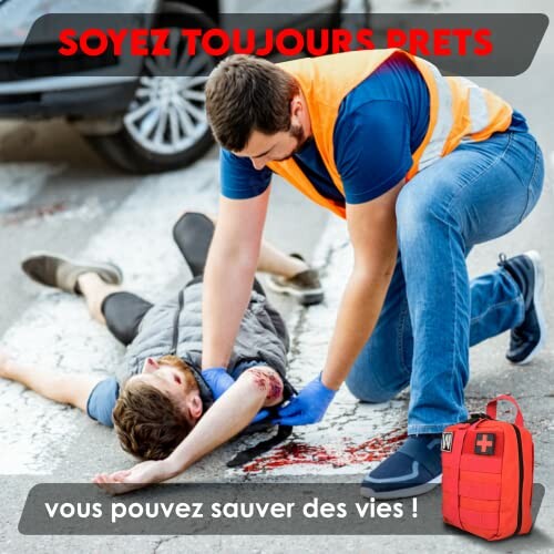 Homme administrant les premiers soins à une victime sur la route.